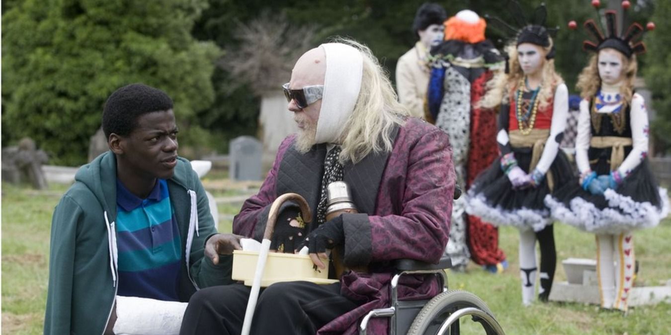 Daniel Kaluuya looks at a man in a wheelchair in Psychoville