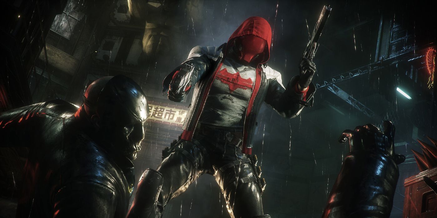 Red Hood beating criminals in Batman Arkham Knight