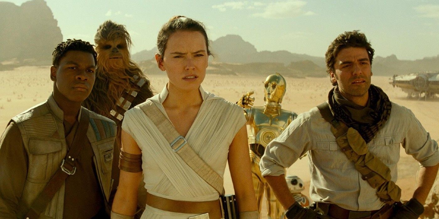 Finn, Chewie, Rey, 3PO, and Poe in the desert in Star Wars