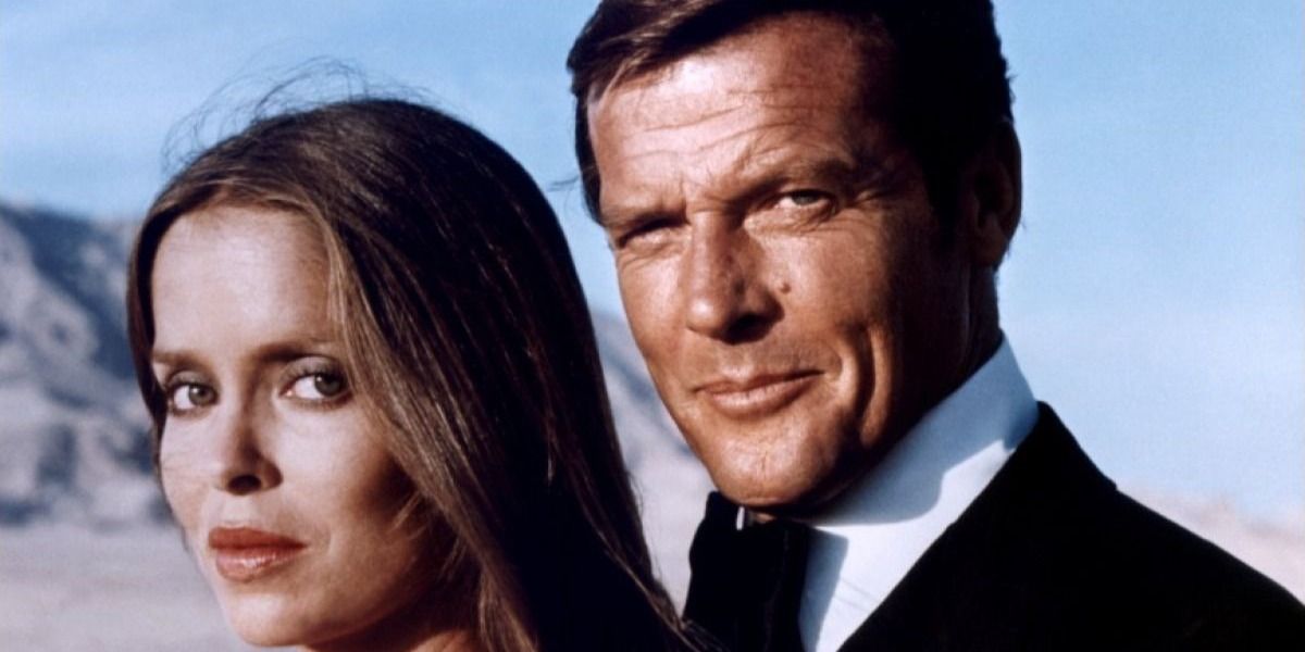 Actors Roger Moore and Barbara Bach pose for the movie The Spy Who Loved Me