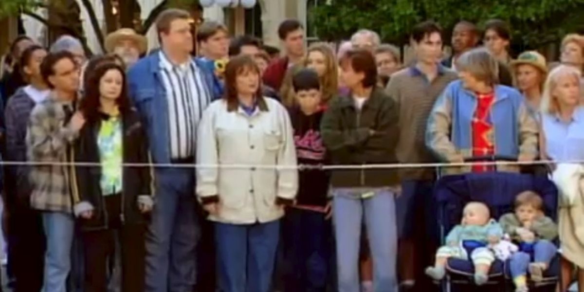 Roseanne family watching the parade.
