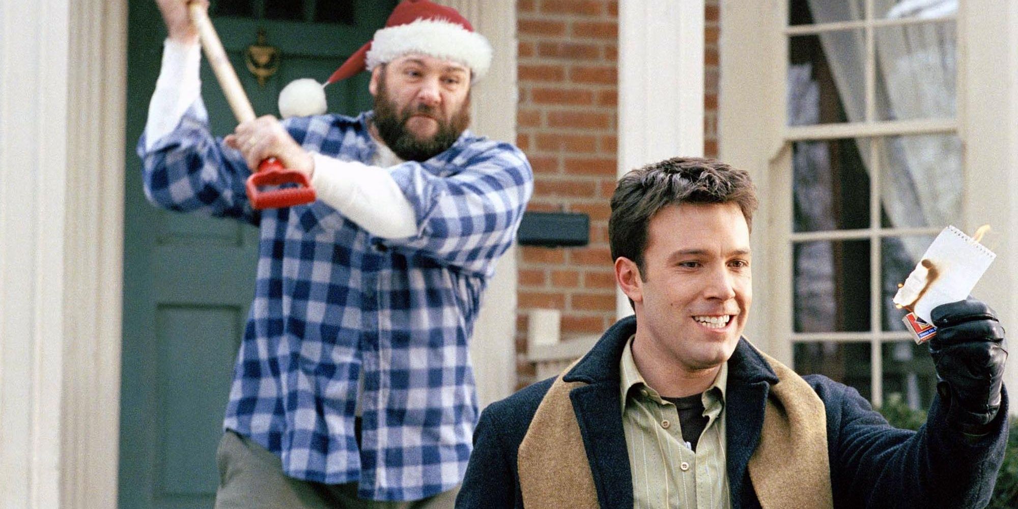 Tom about to hit Drew with a sign in Surviving Christmas