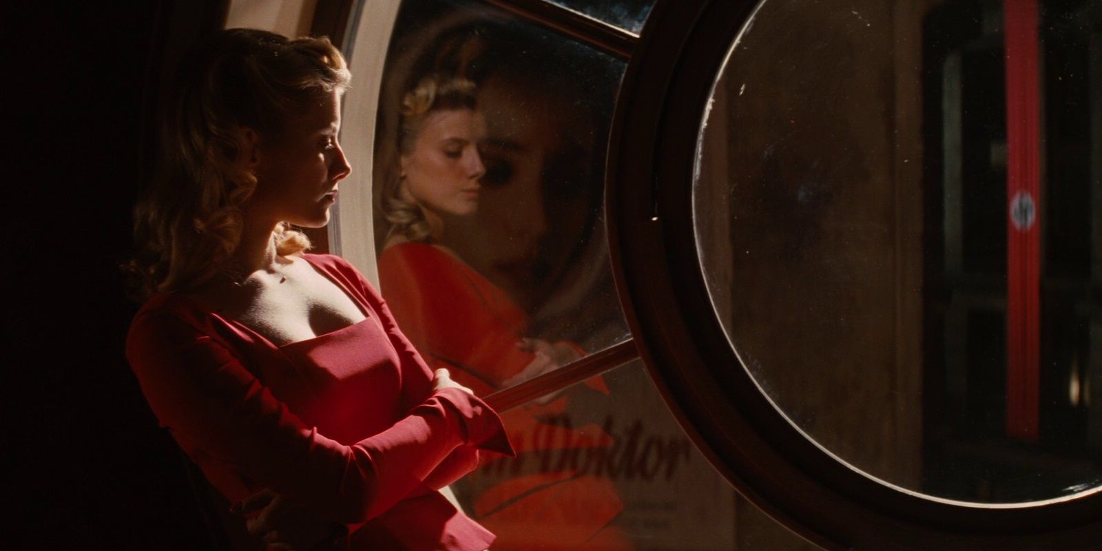 Shoshanna standing by a window in Inglourious Basterds