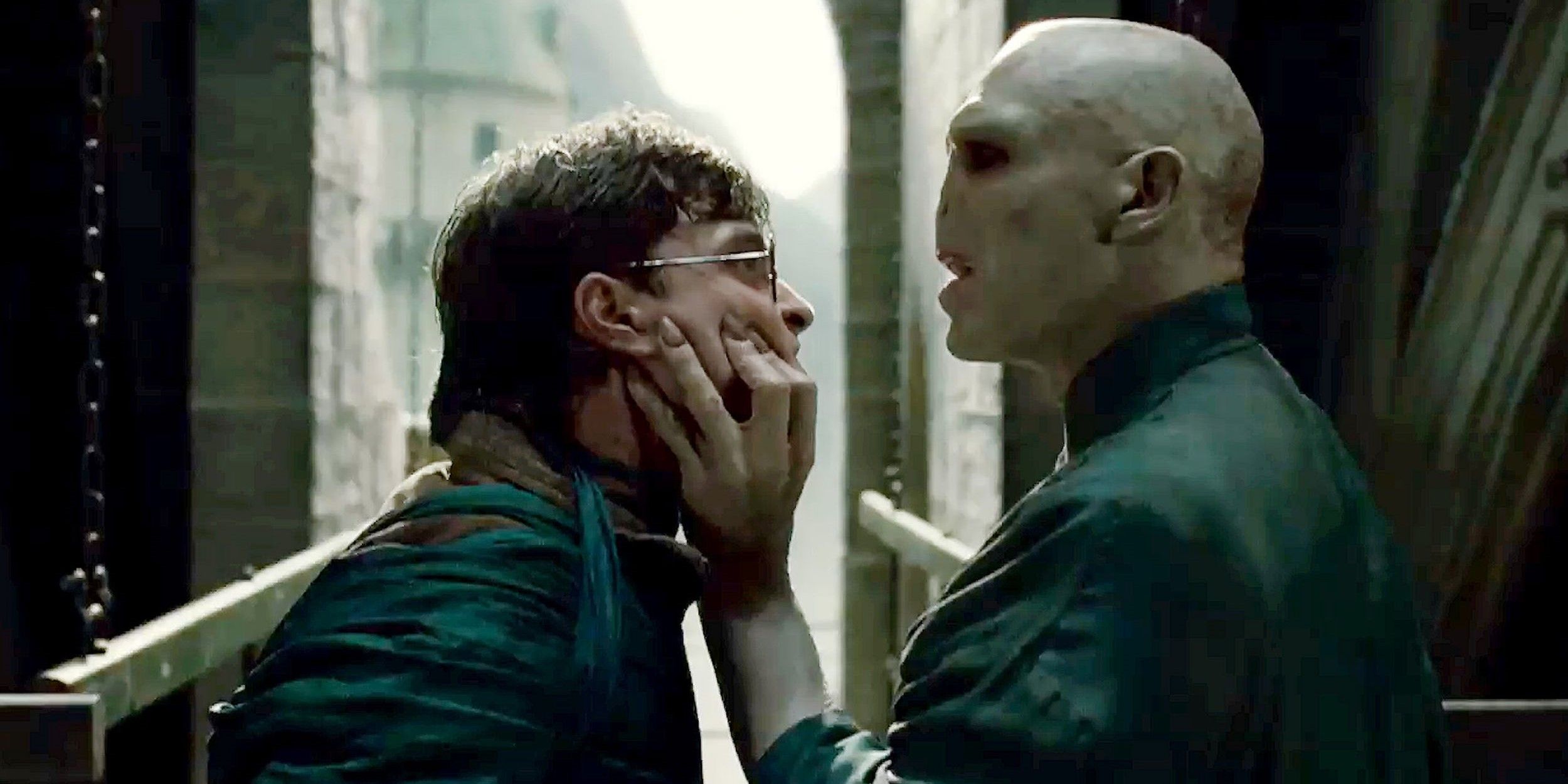 Voldemort holds Harry by the neck in Deathly Hallows