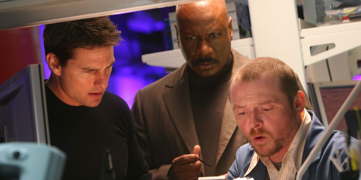 Benji works on his computer next to Ethan and Luther in Mission Impossible III