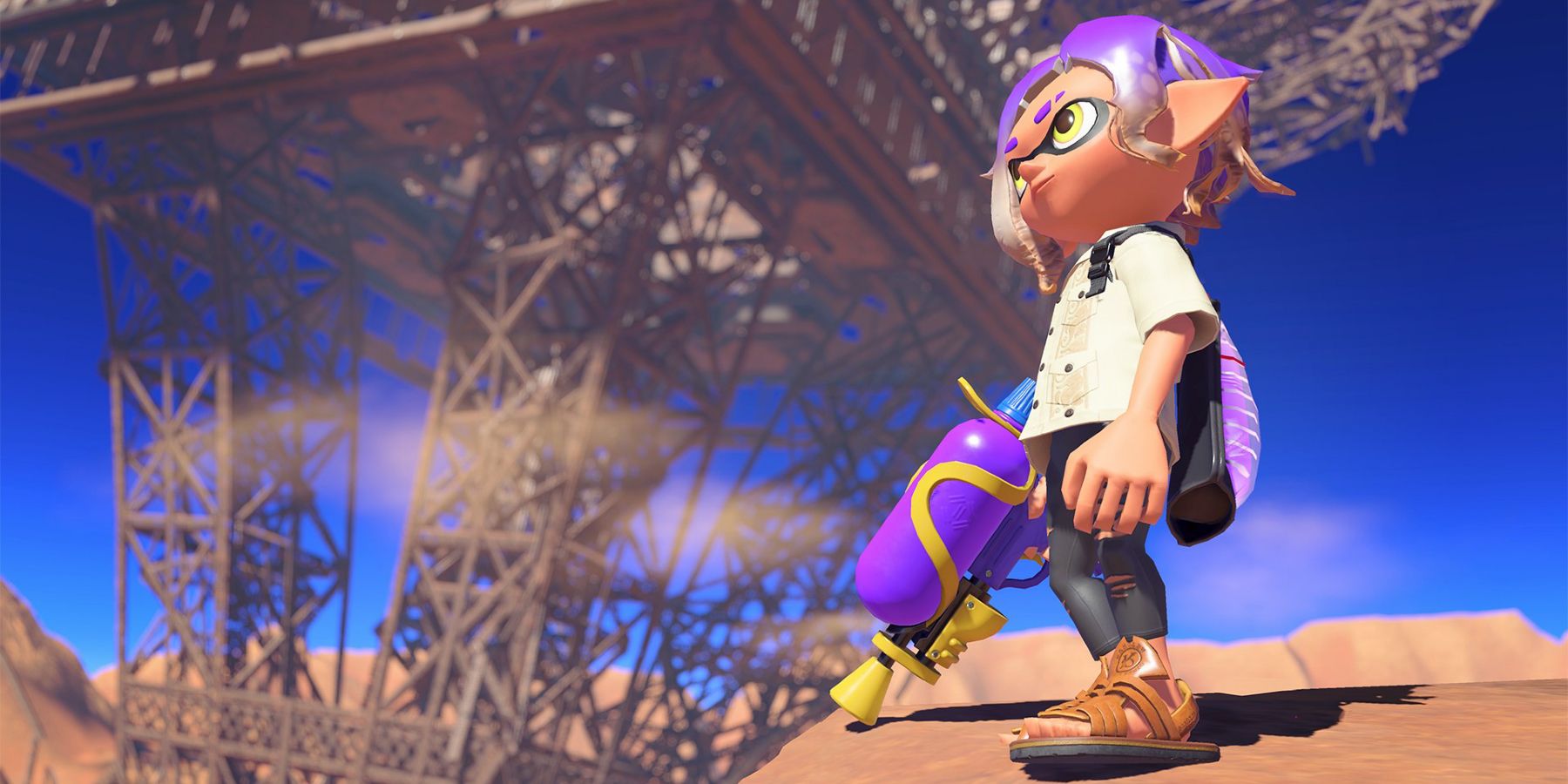 A punk kid with purple hair stands in an empty city in Splatoon 3