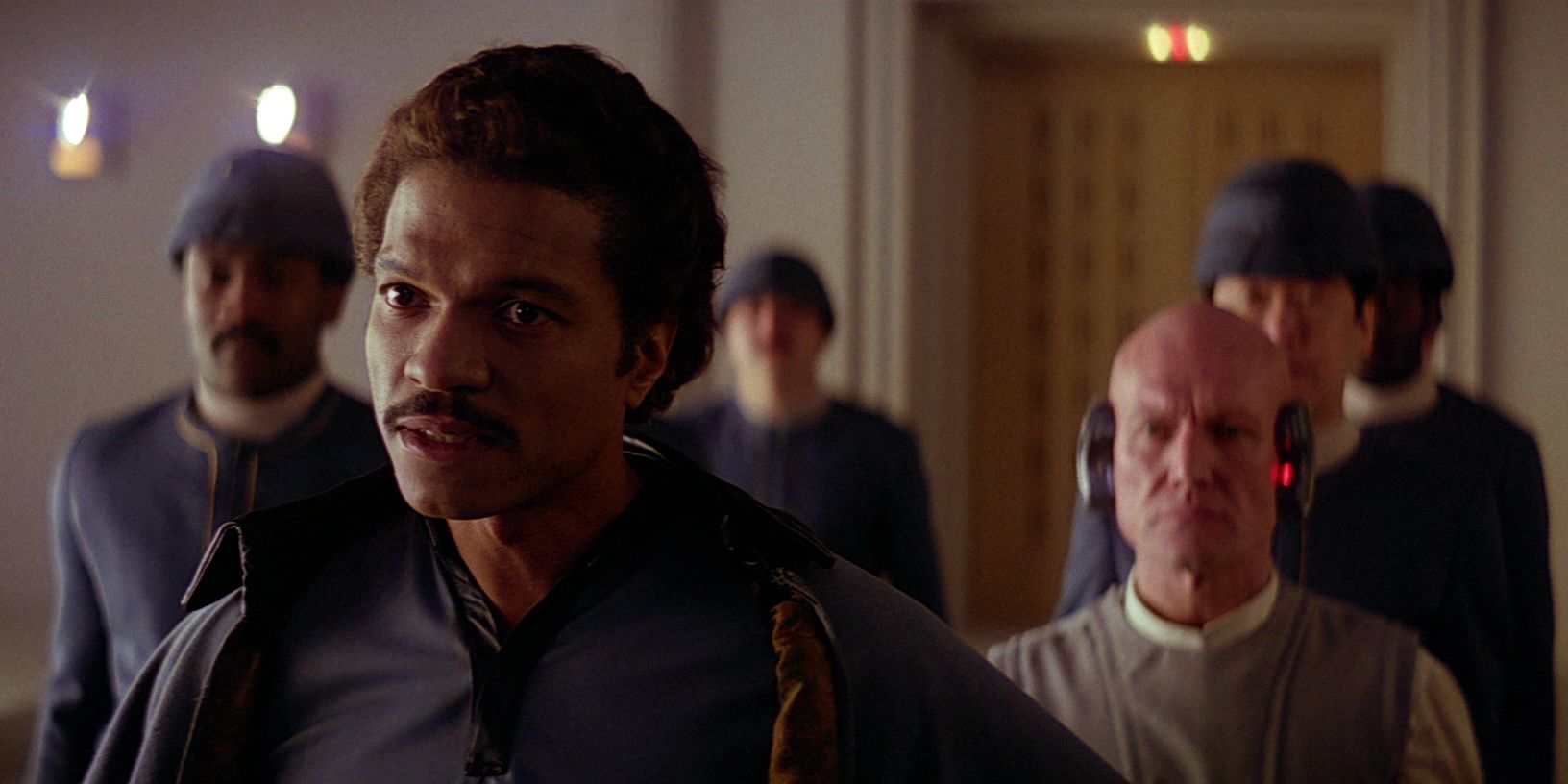 Lando Calrissian greets and is reunited with Han Solo on Bespin in The Empire Strikes Back