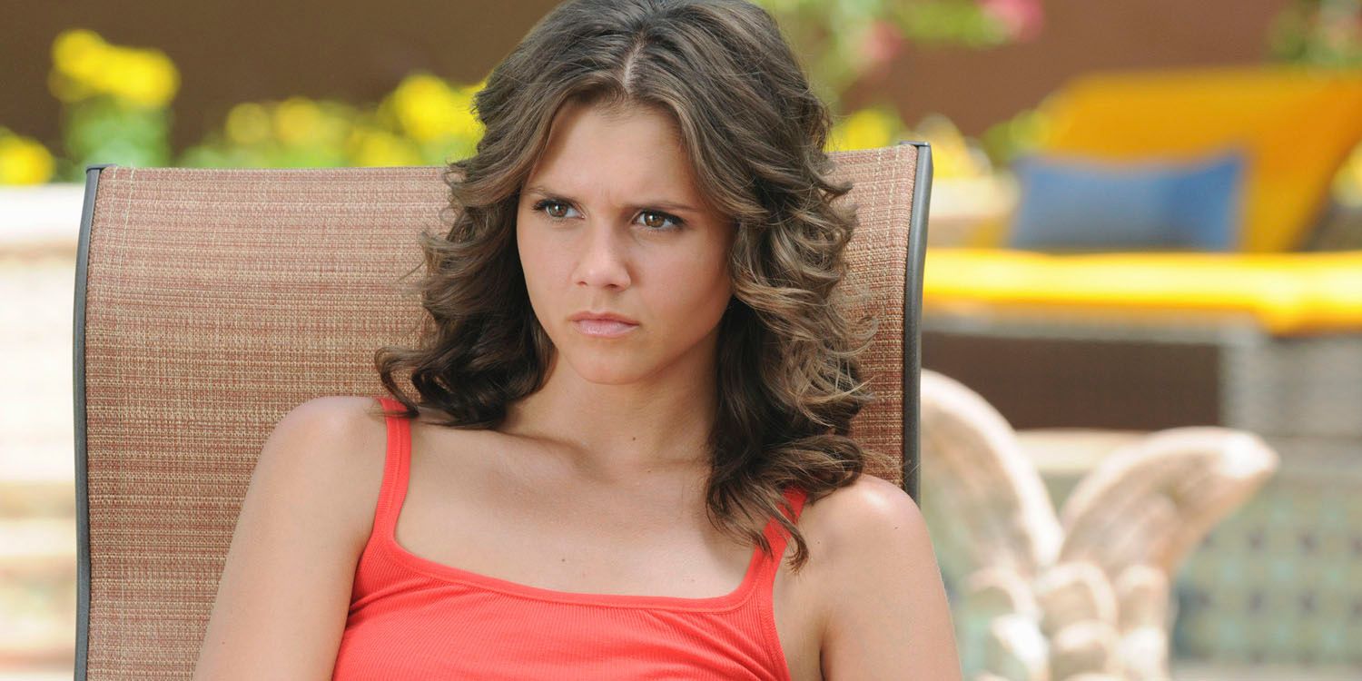 Alexandra Chando as Sutton Mercer in The Lying Game lounging in the sun and pouting.