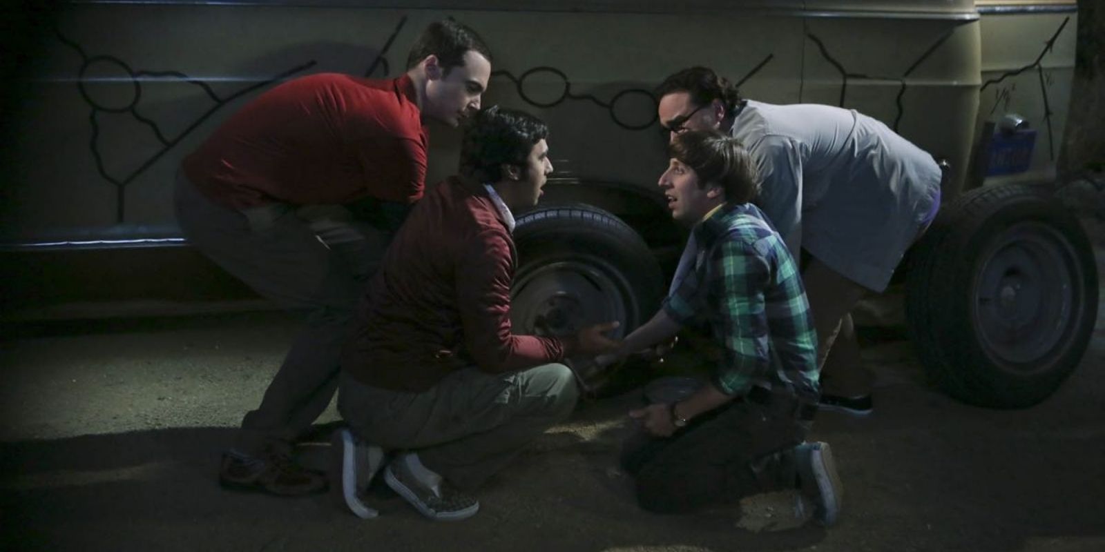 The guys trying to change a flat tire in TBBT
