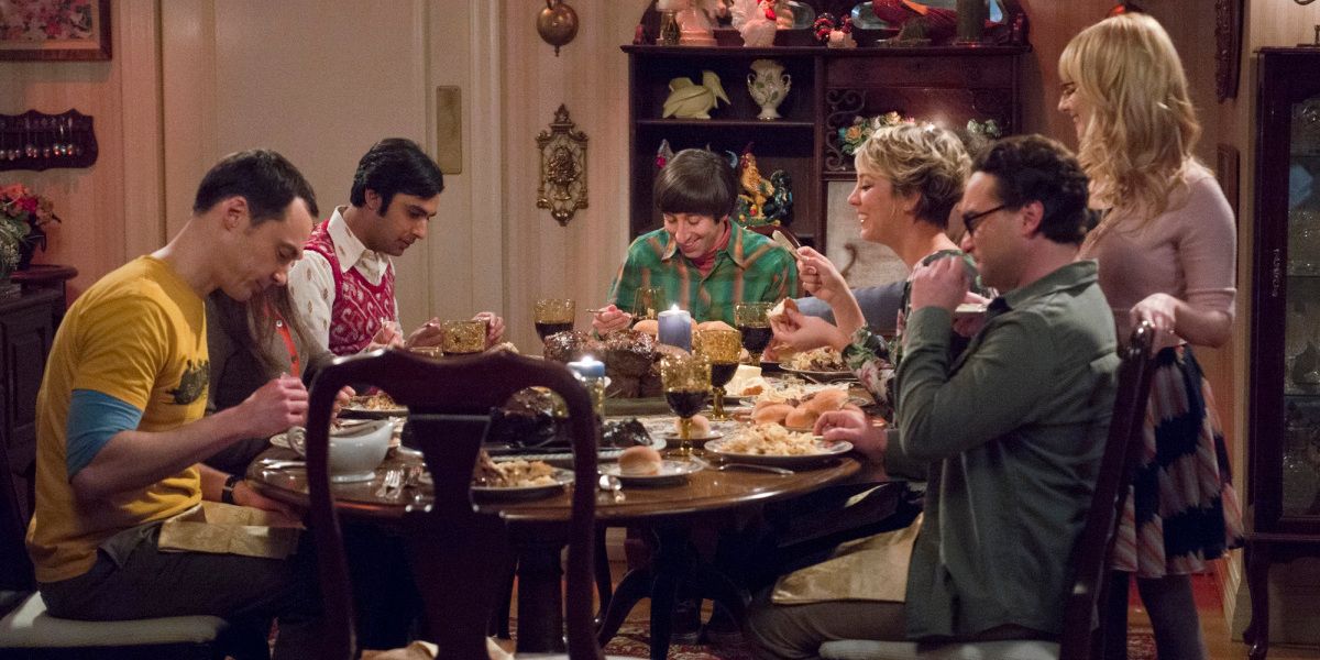 The gang eating dinner at the Wolowitz' dining room in TBBT