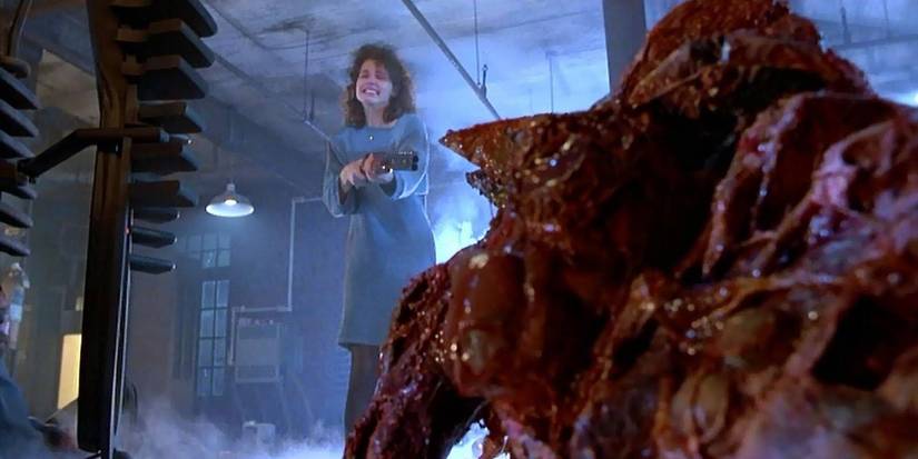 Gina Davis' character Veronica Quaife tries to shoot the "Brundlefly" movie monster in David Cronenberg's The Fly (1986).