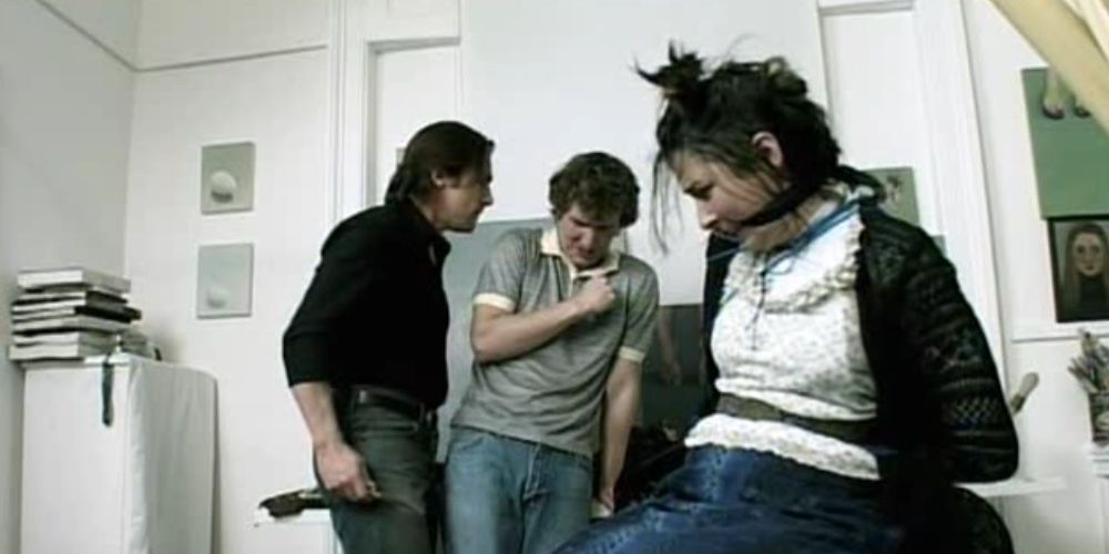 Kevin Howarth and Mark Stevenson with a tied-up woman in The Last Horror Movie