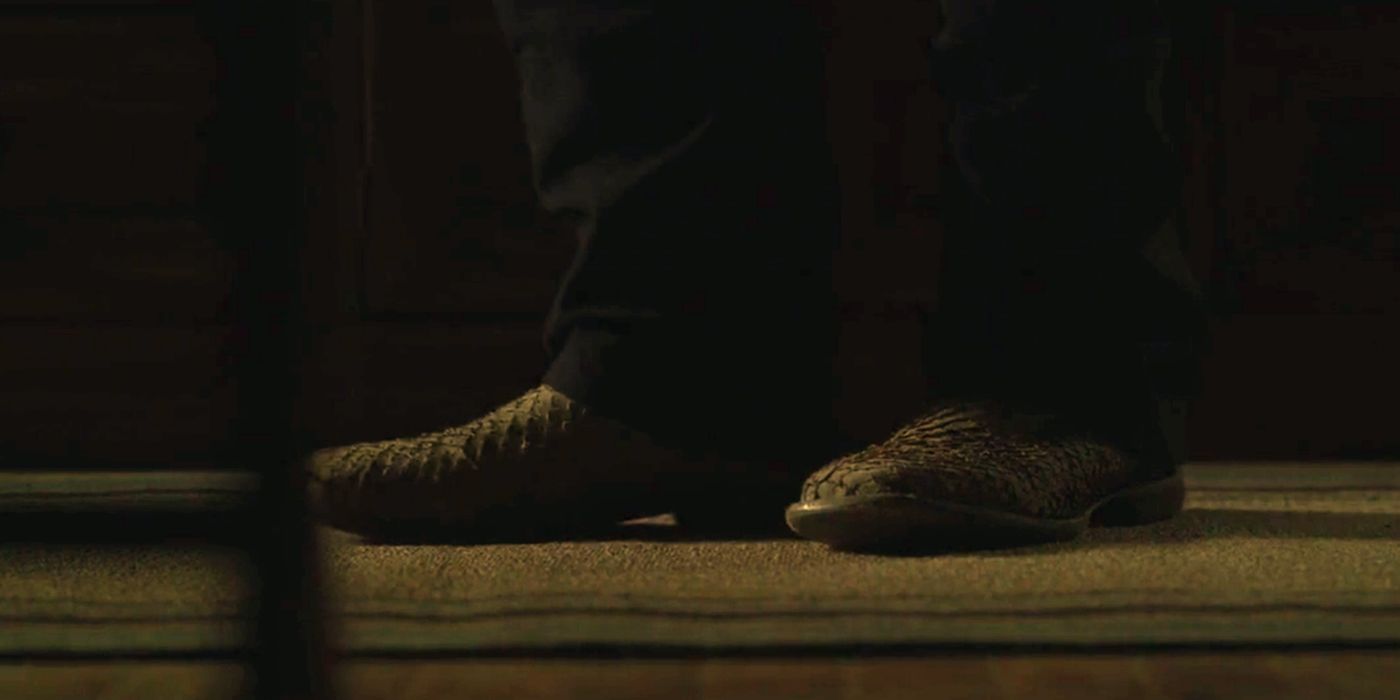 Deacon wearing the killer's boots in The Little Things
