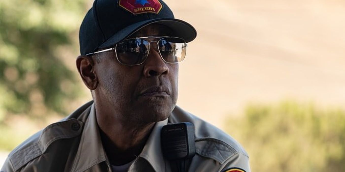 Denzel Washington as deputy sheriff Deacon, wearing sunglasses and a hat in The Little Things.