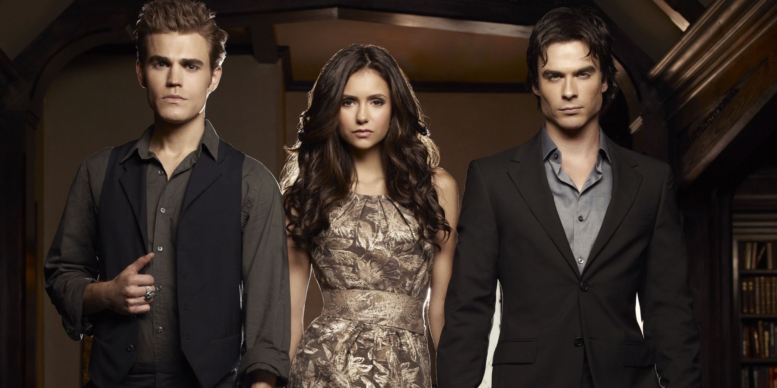 Stefan, Elena, and Damon in a promo image for The Vampire Diaries
