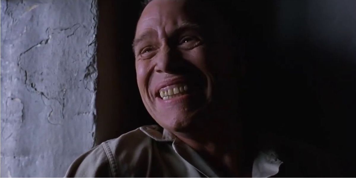 Elmo Blatch laughs in prison in The Shawshank Redemption