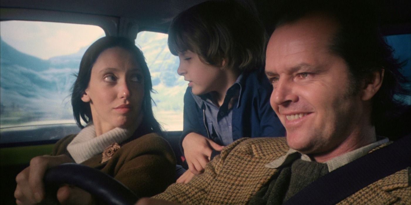 Johnny, Wndy, and Danny Torrance in the car in The Shining