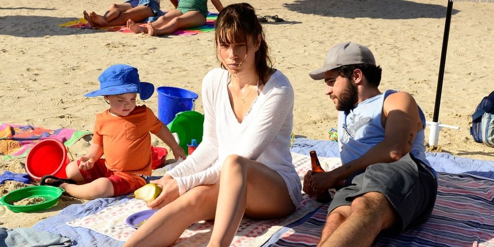 Cora with her husband and son on the beach in The Sinner season 1