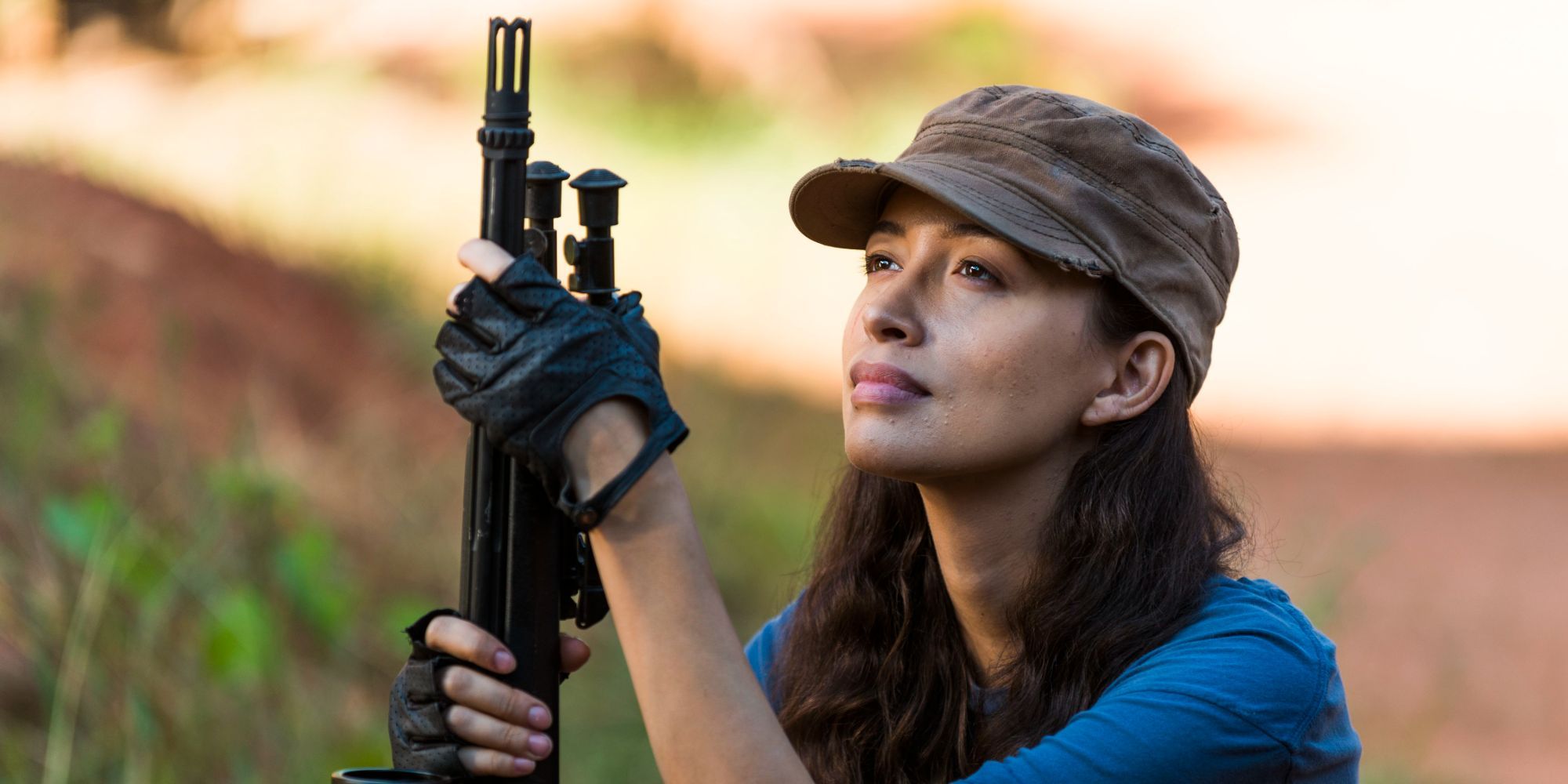 Rosita Espinosa holding a gun in The Walking Dead
