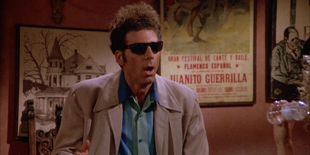 Kramer wearing dark shades and talking