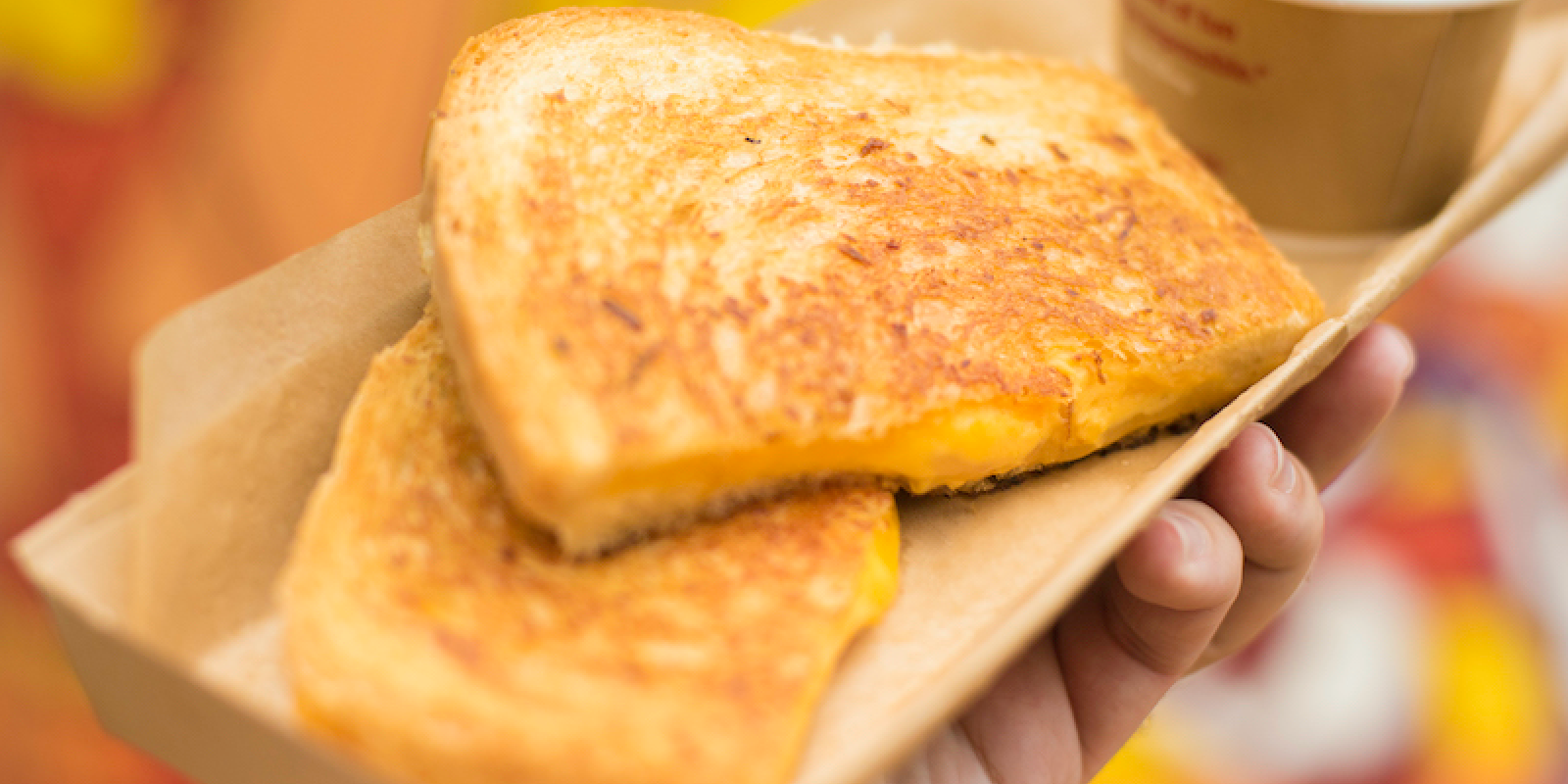 Cheddar sandwich held
