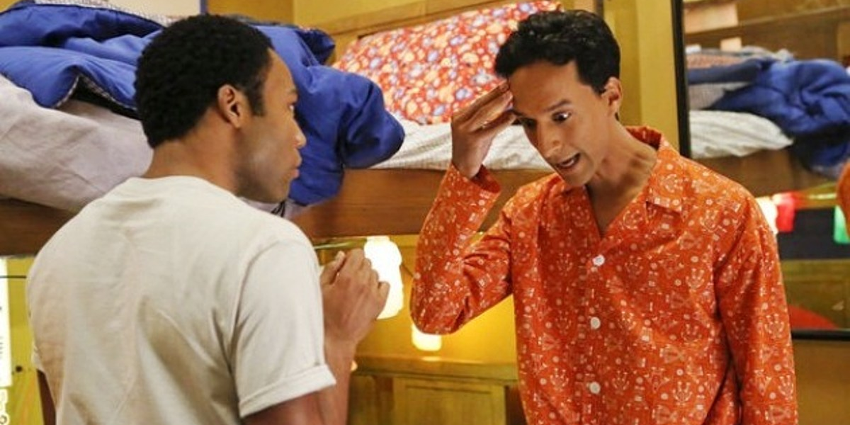 Troy and Abed face each other in their pjs, confused about what's happening