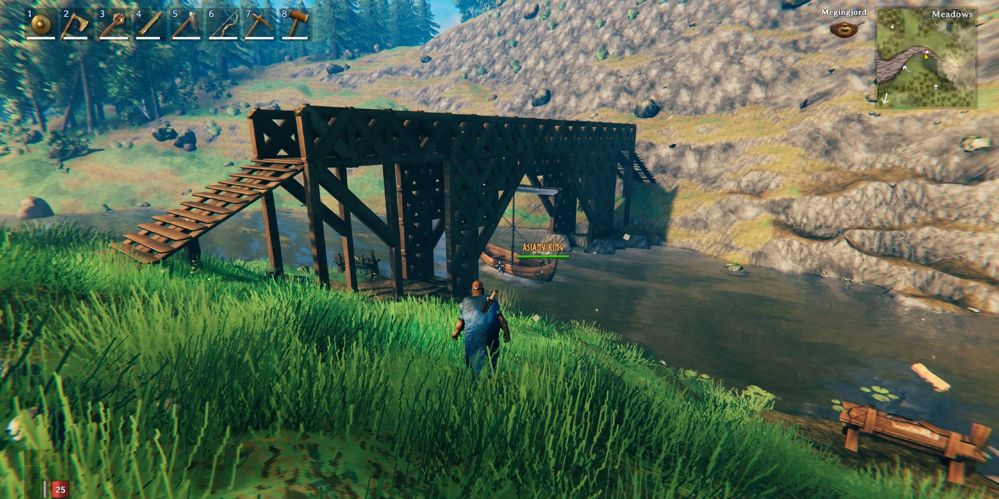 A player builds a bridge with an underpass for boats in Valheim