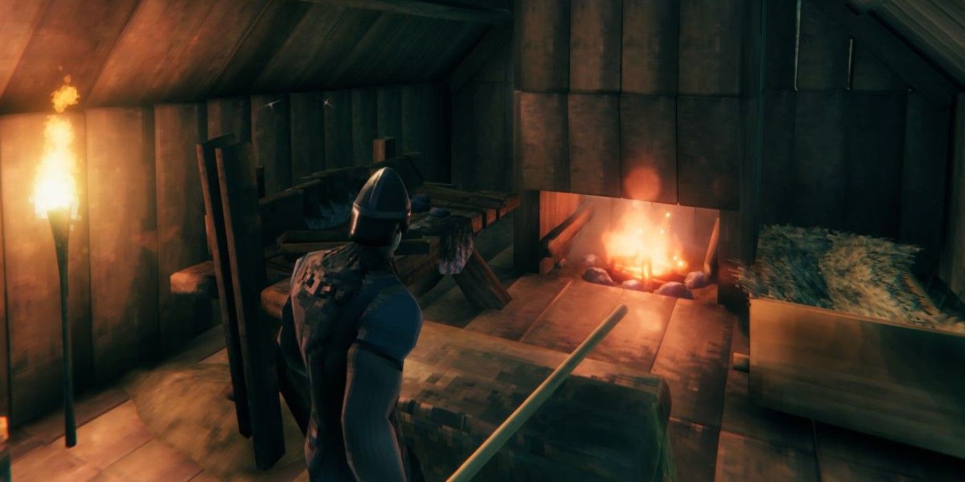 A player stands in front of their fireplace and chimney in Valheim