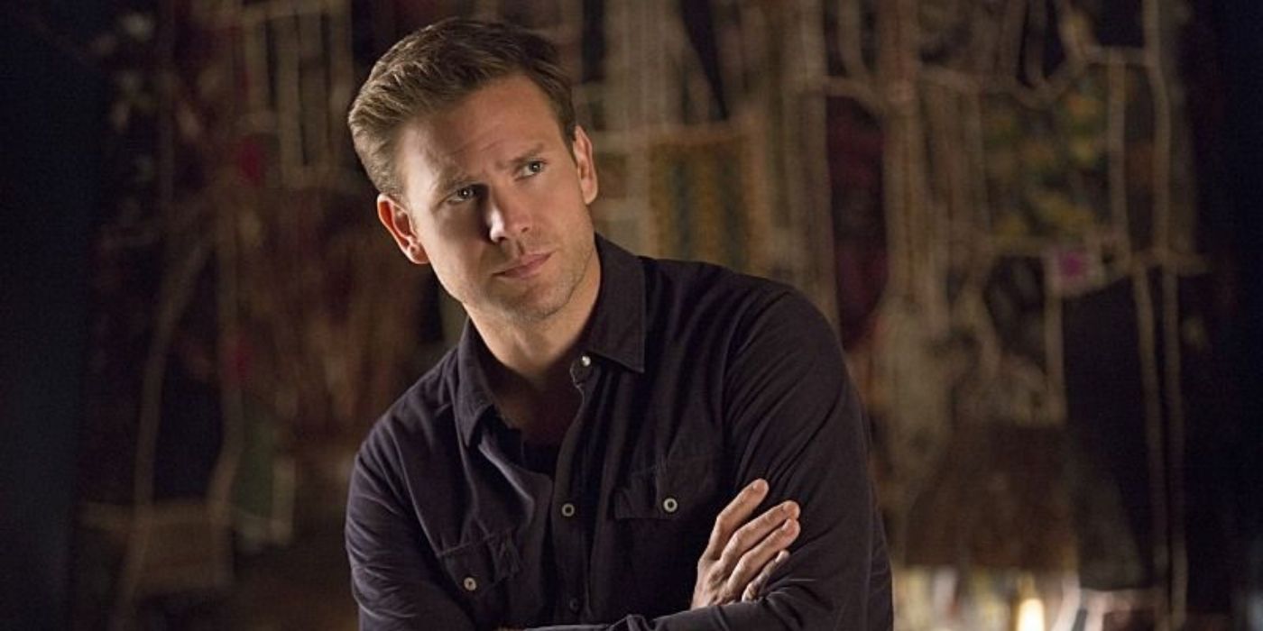 Alaric Saltzman with his arms crossed in The Vampire Diaries