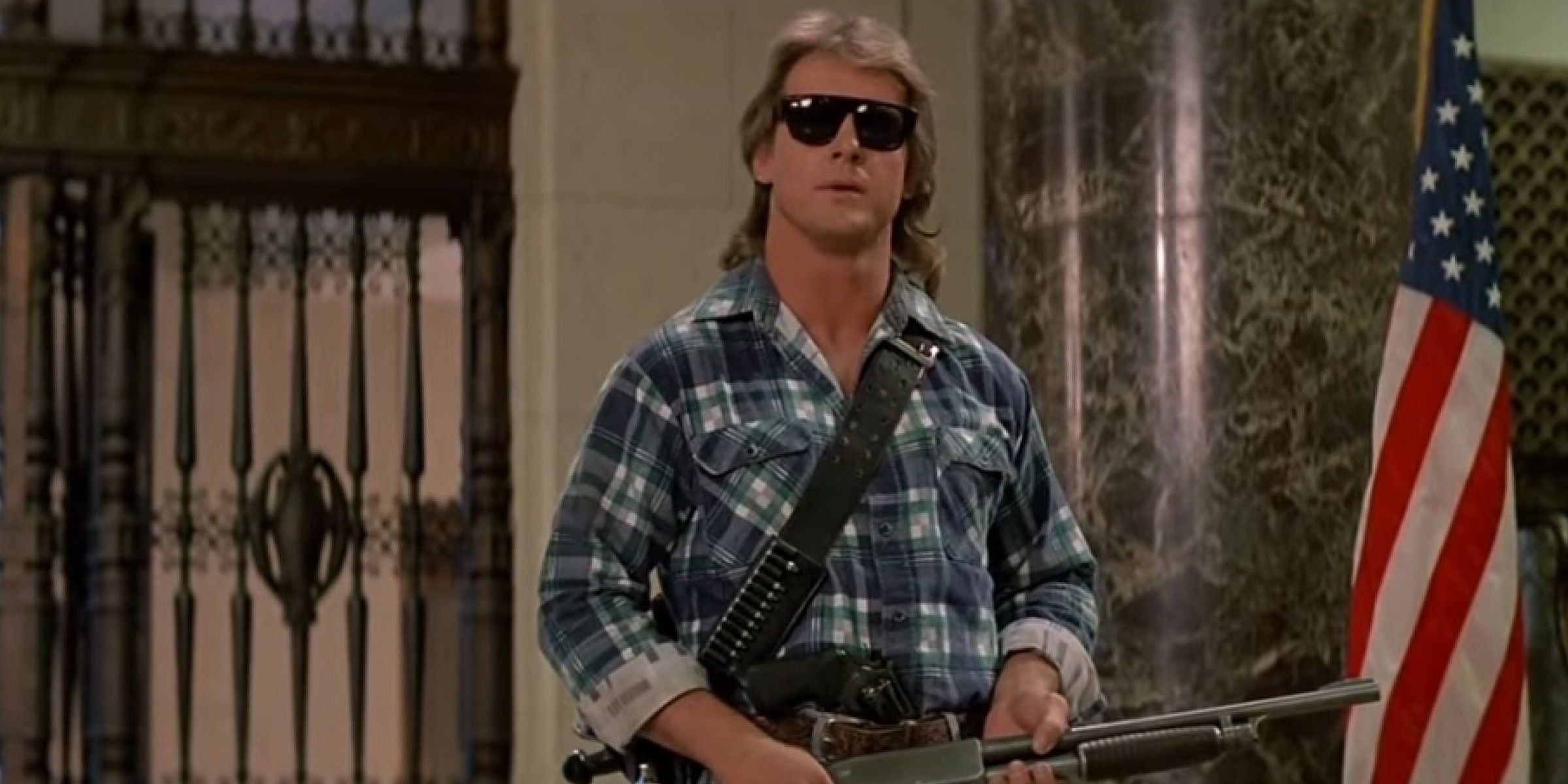 Roddy Piper wearing sunglasses in They Live