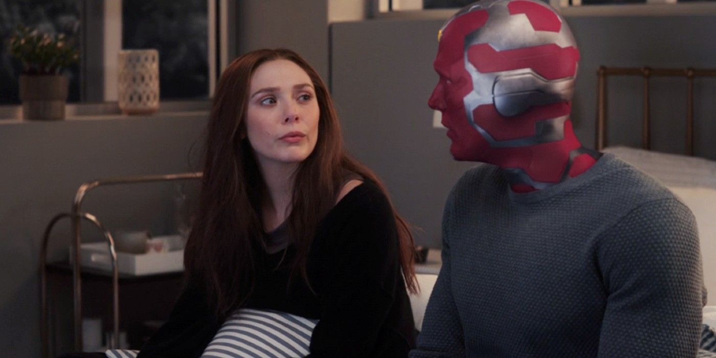 Wanda and Vision sitting on her bed and talking about grief in WandaVision