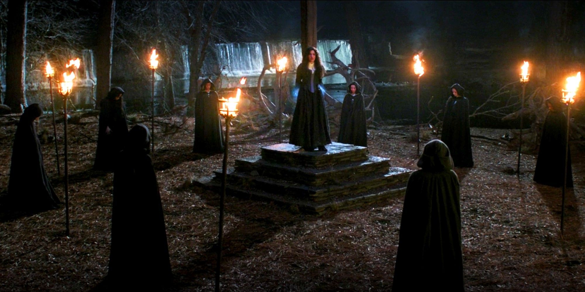 Agatha Harkness surrounded by the witch's coven in WandaVision