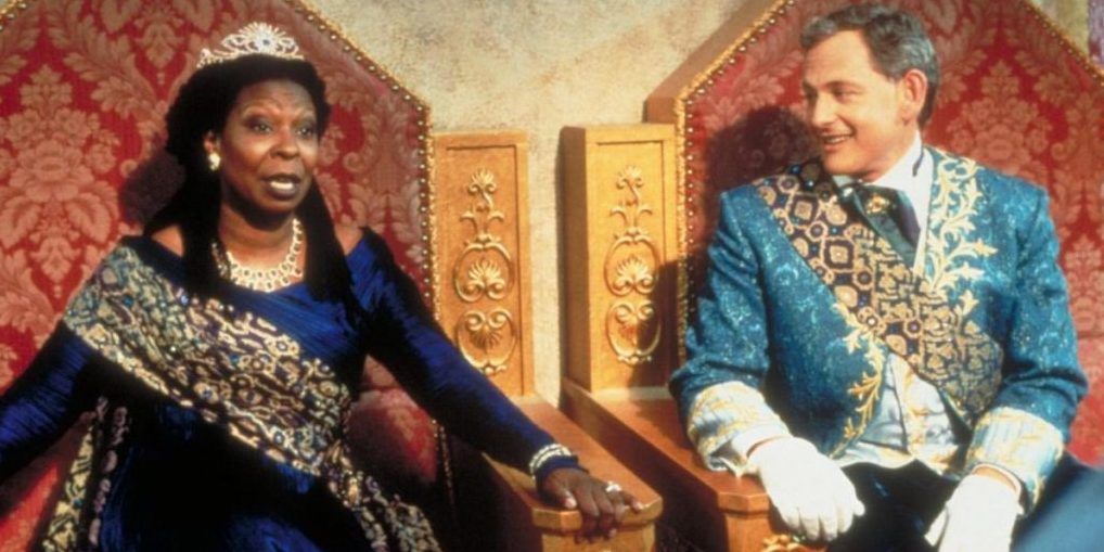 The King and Queen sit on their throne at the ball in Cinderella 1997