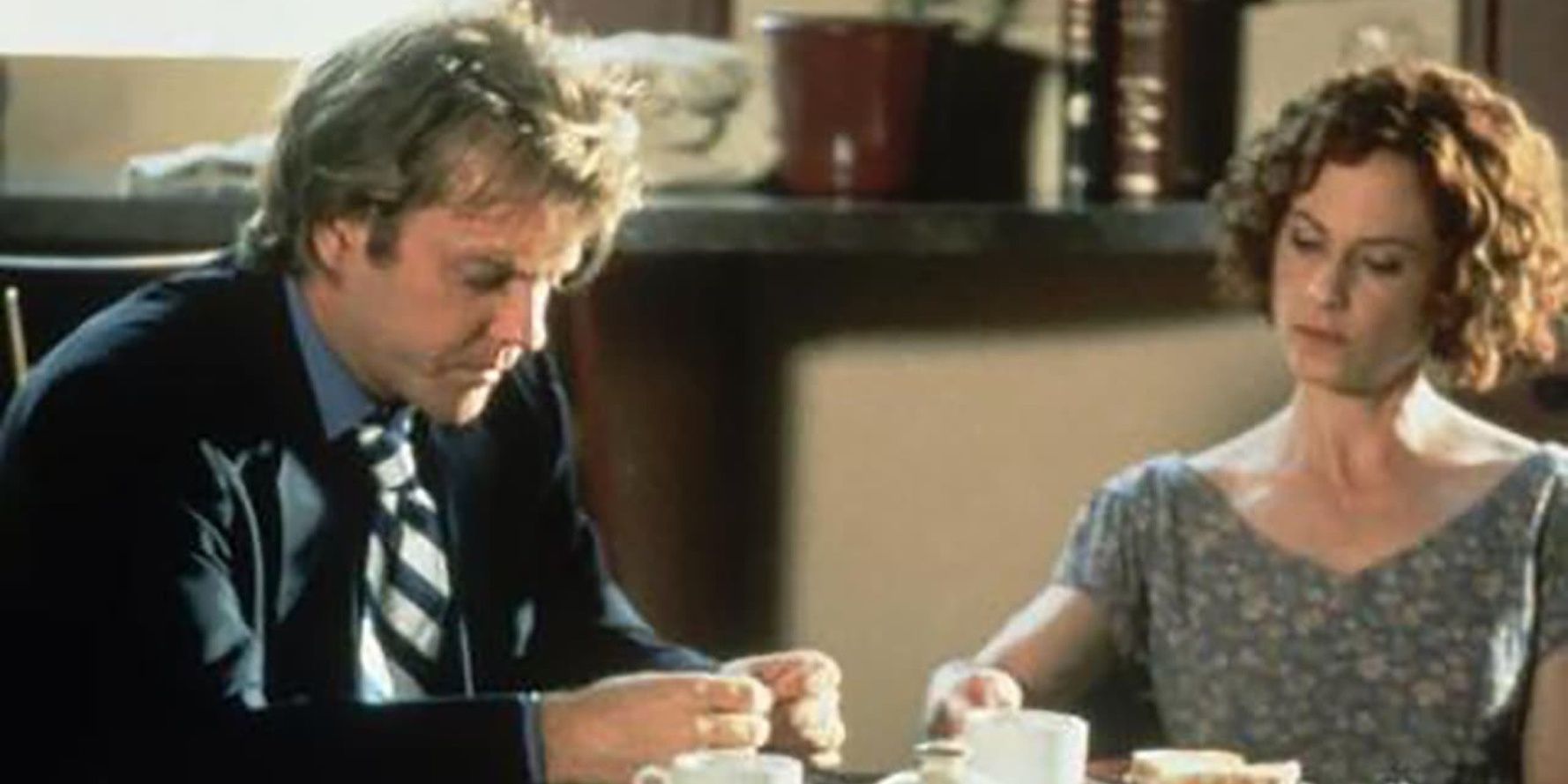 Kiefer Sutherland and Holly Hunter in Woman Wanted/.