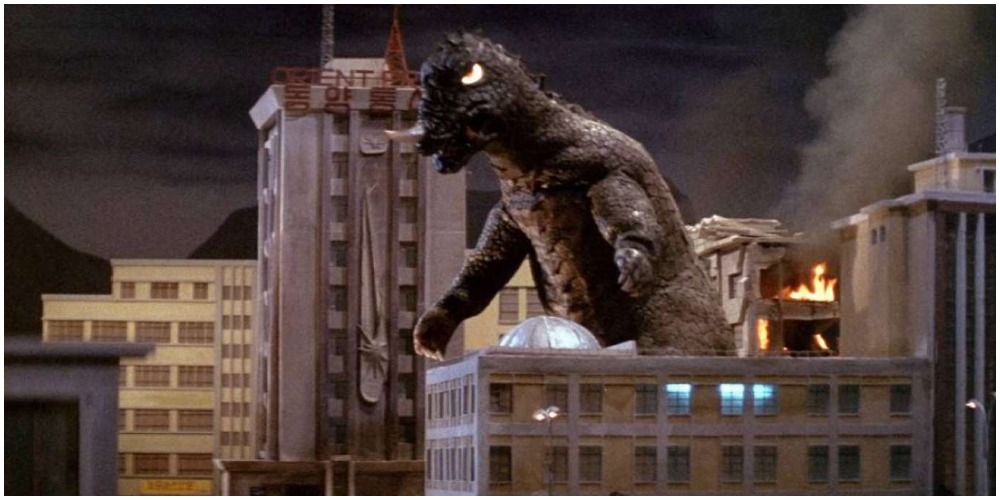 Godzilla-Like Creature Walking Through Burning Buildings