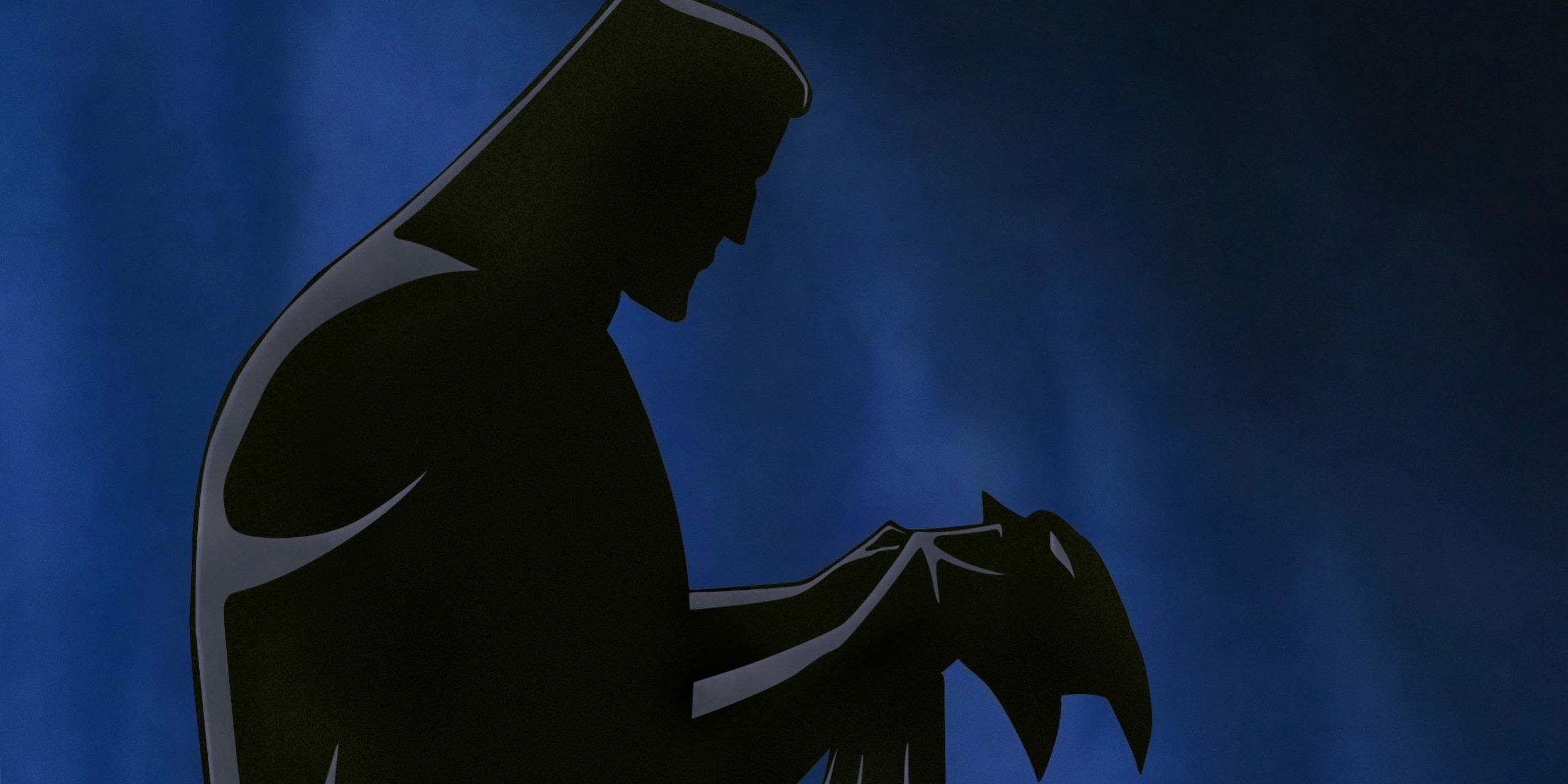 Batman alone holding cowl