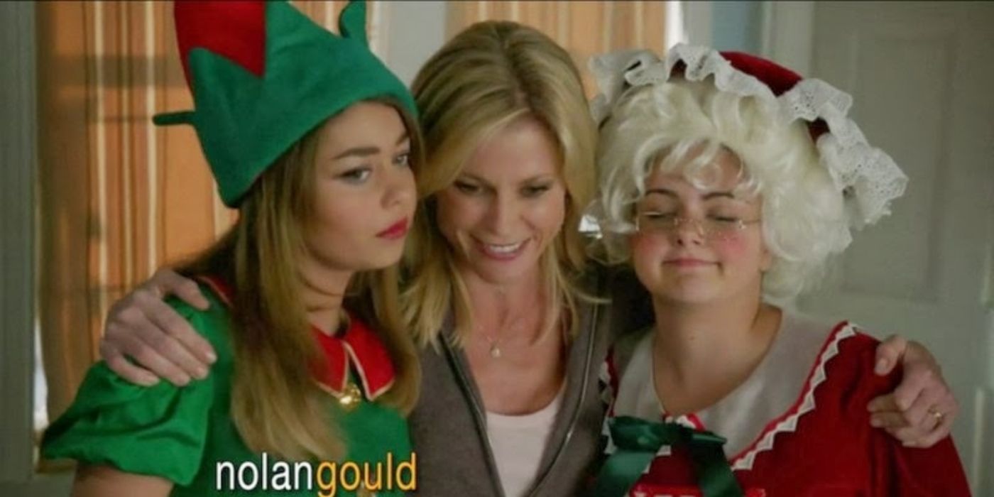 claire with alex and haley - modern family