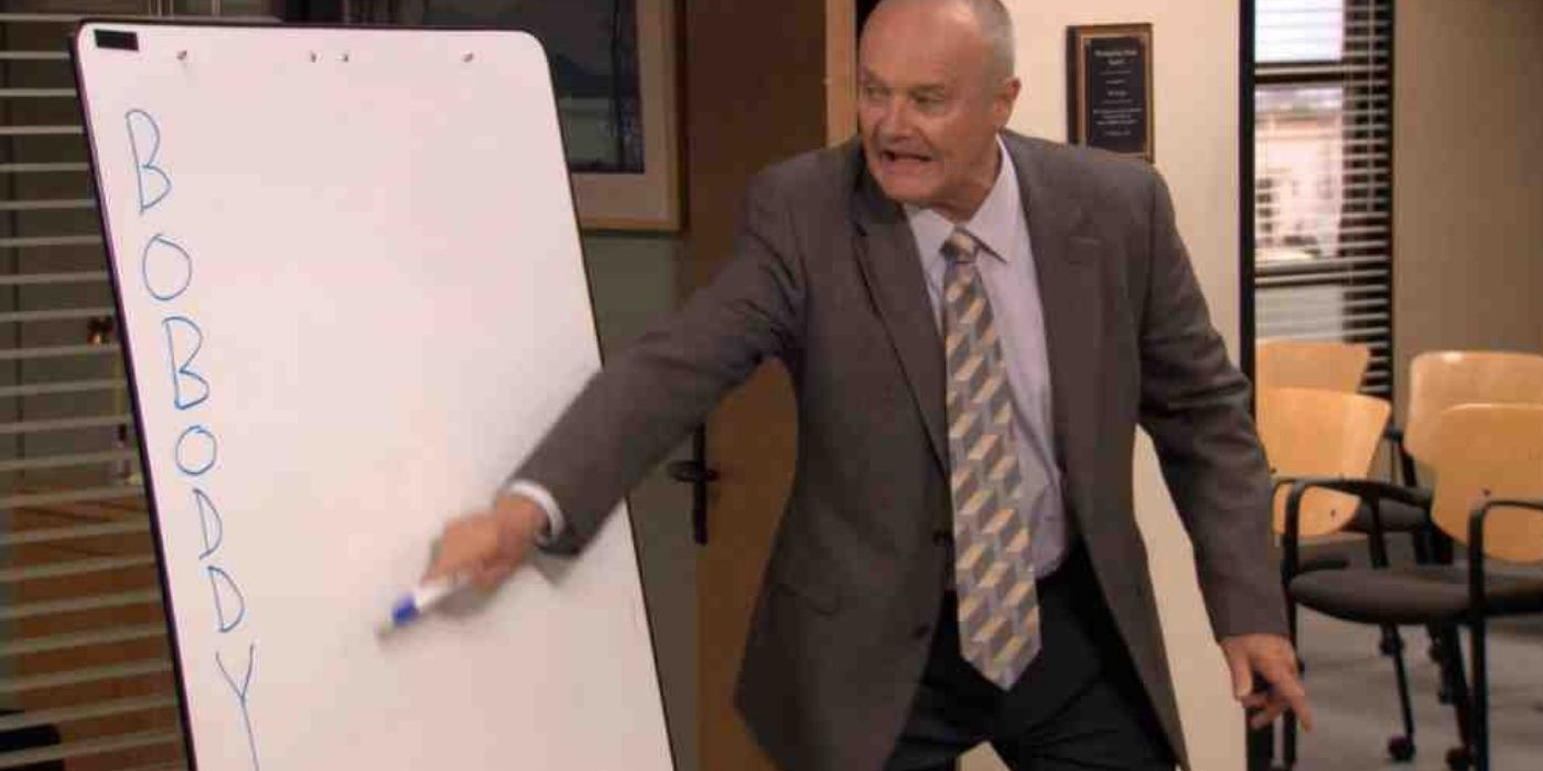 Creed pointing at the white board in which he has written the acronym BOBODDY without expanding it 