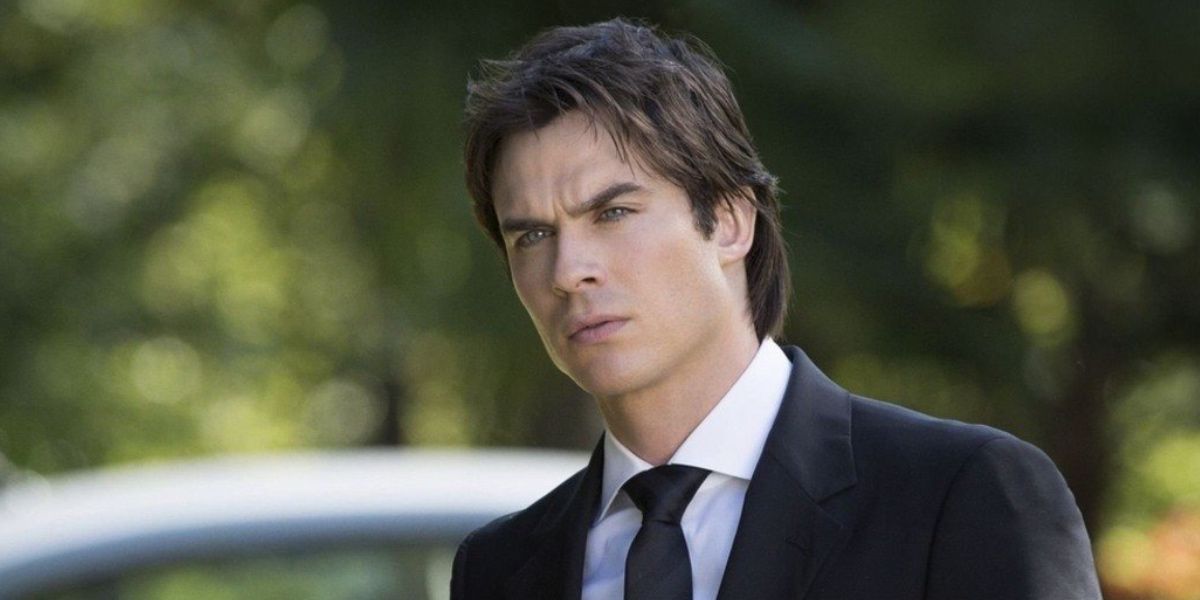 Damon looking serious outside on The Vampire Diaries