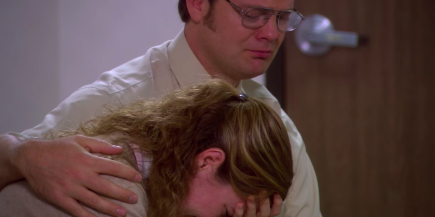 Dwight consoles a crying Pam in The Office