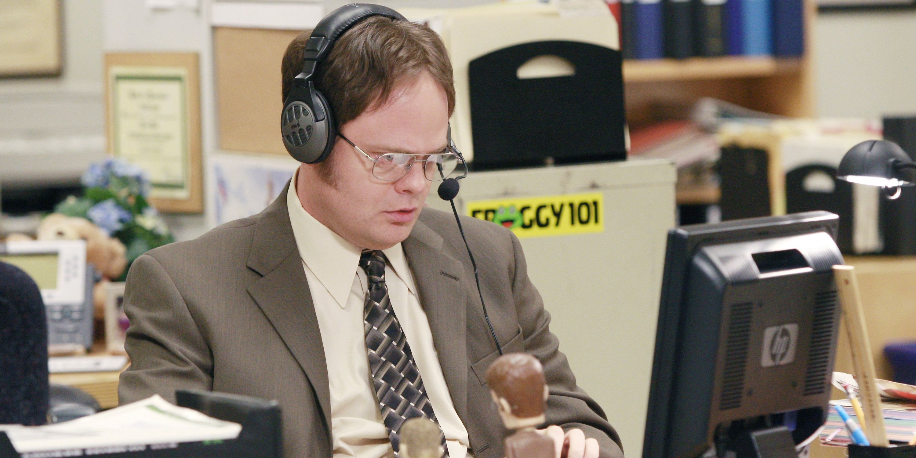 Dwight works at his computer in The Office