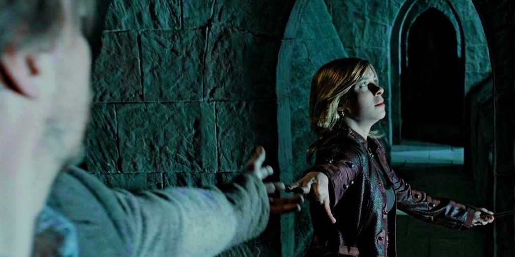 Lupin reaching out for Tonks' hand at Hogwarts