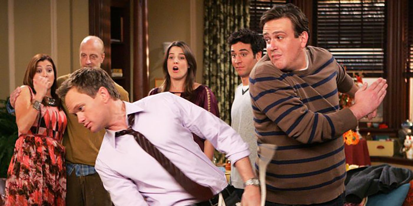 Barney moving away as Marshall slaps him on How I Met Your Mother
