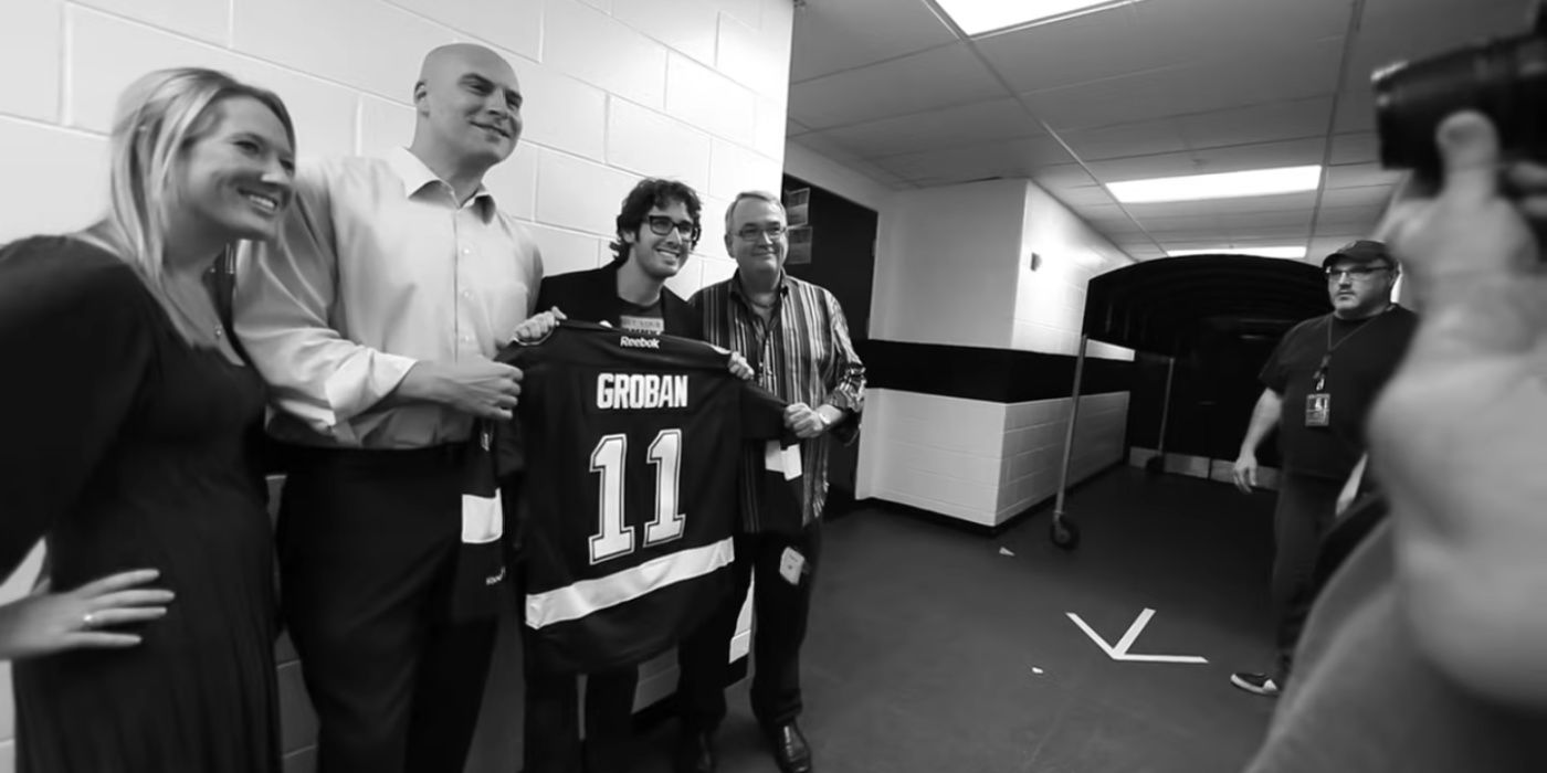 josh groban poses with a custom jersey in the if i walk away video
