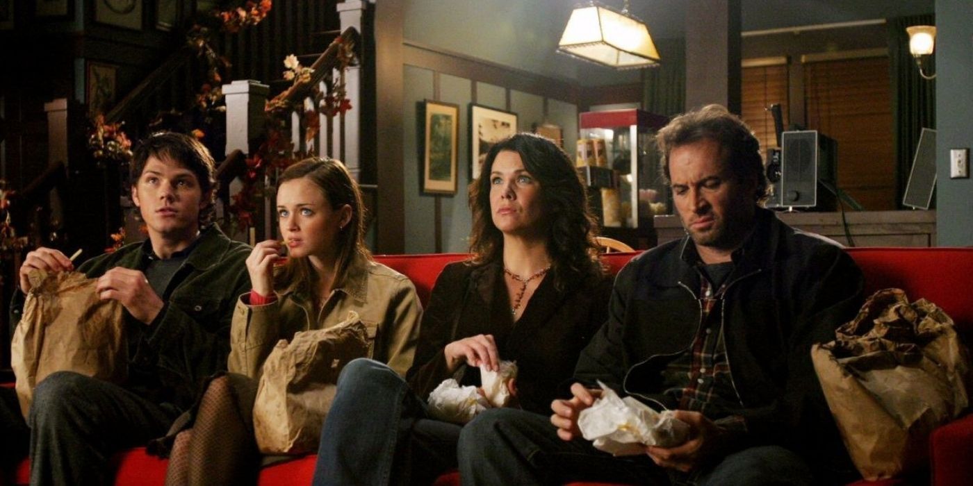 Dean, Rory, Lorelai, and Luke at the movies on Gilmore Girls