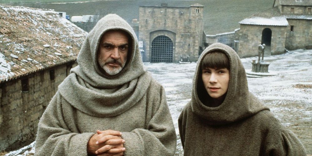 Sean Connery and a young boy dressed as monks in The Name Of The Rose 