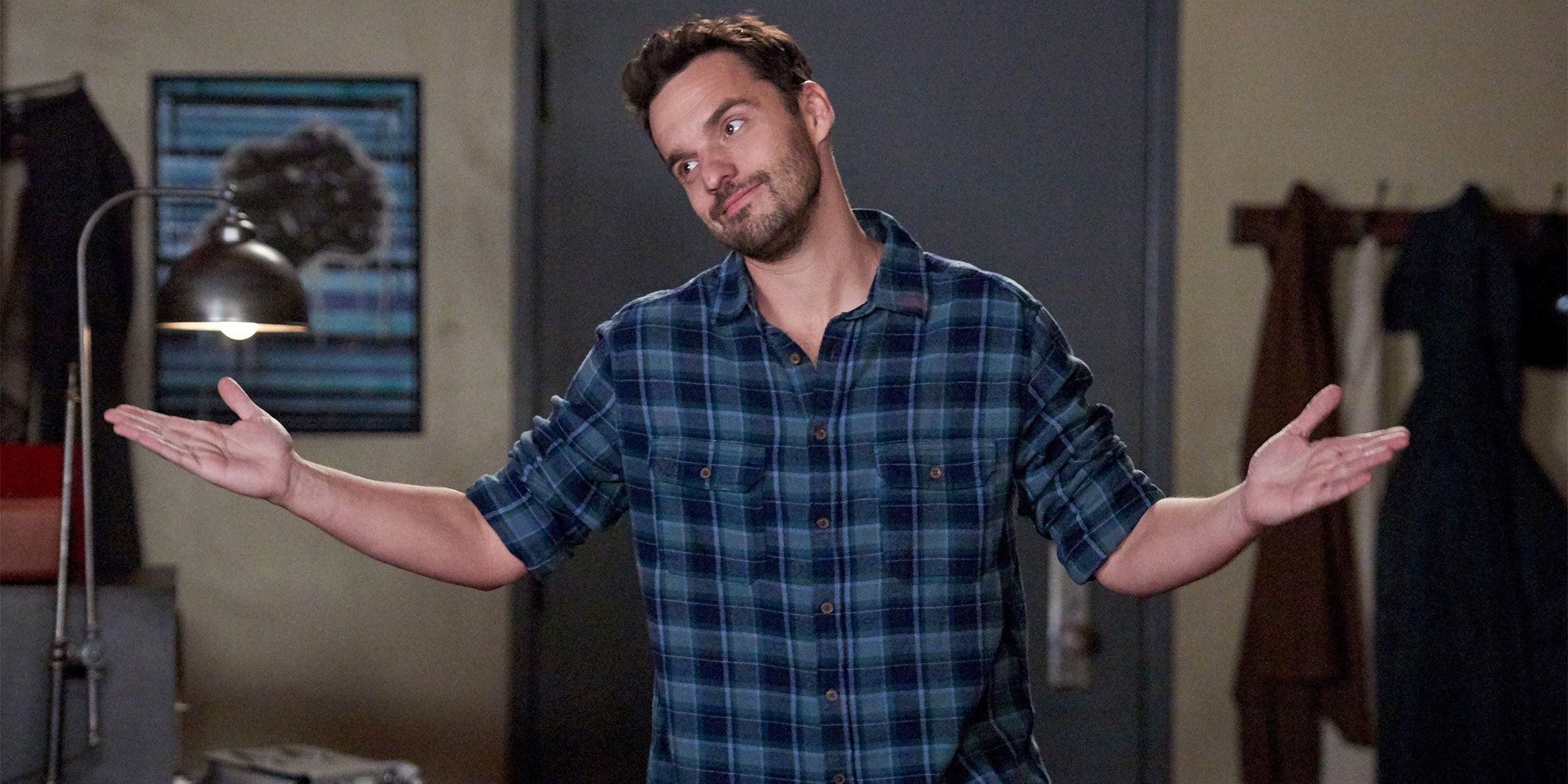 Nick shrugs while at his loft in New Girl