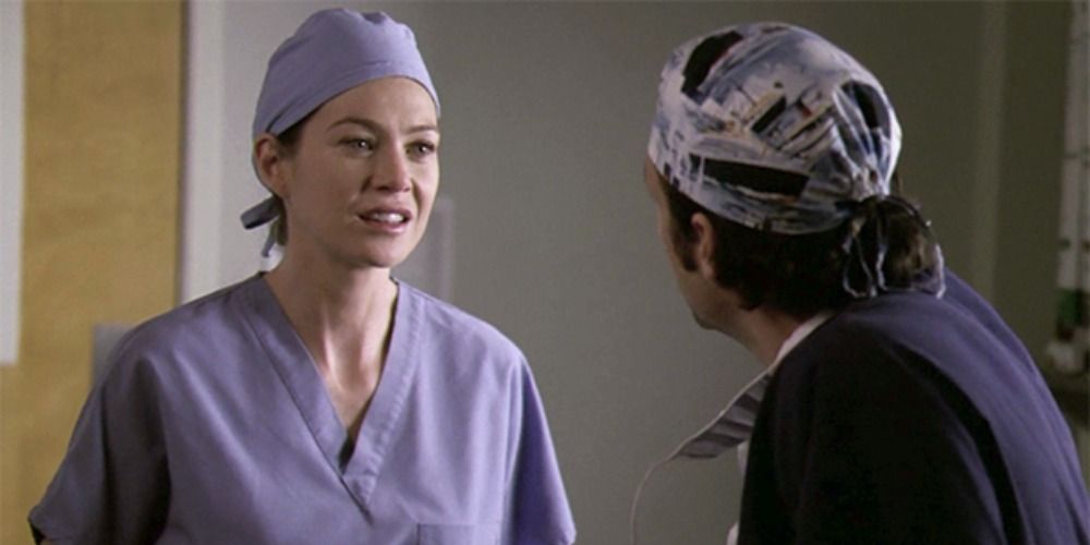 Meredith and Derek talking at the hospital on Grey's Anatomy