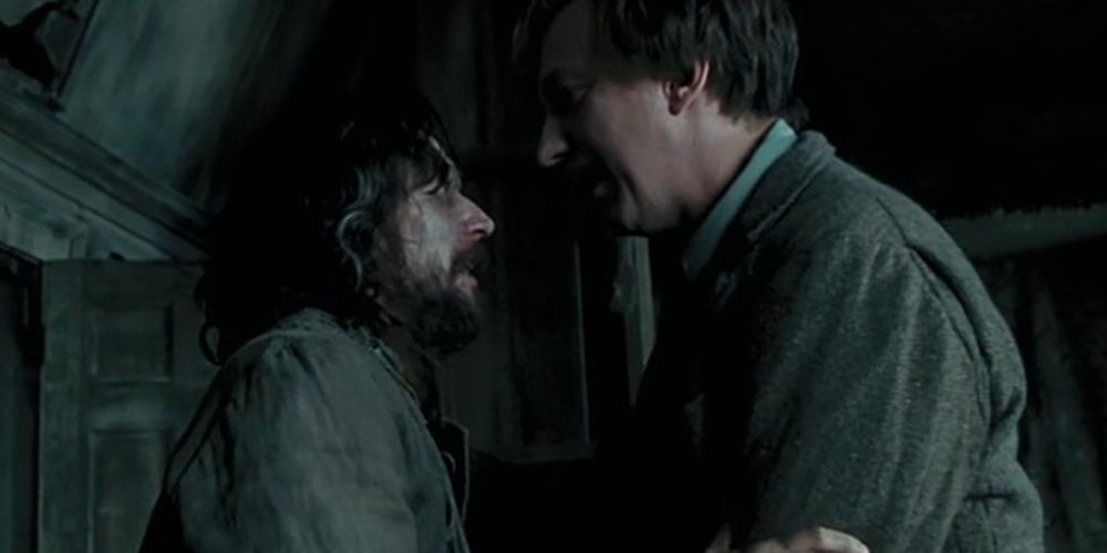 Lupin and Sirius talk close to each other in Harry Potter.