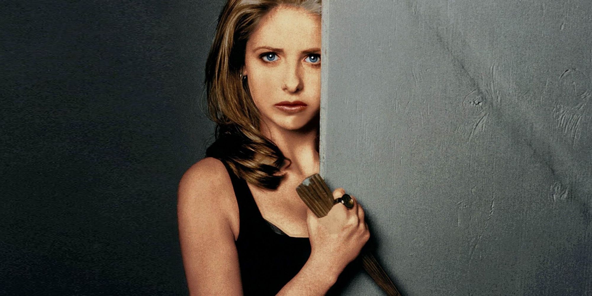 An image of Buffy Summers holding a stake
